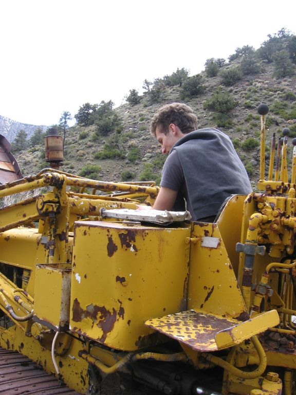 Josh pretending to use one of the tractors to resume mining in 2006: